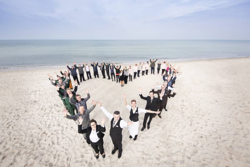 Fischland & Dünenmeer Team am Strand